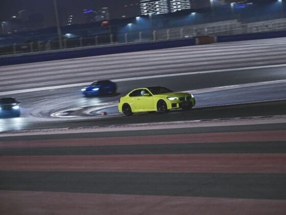 BMW cars racing on track