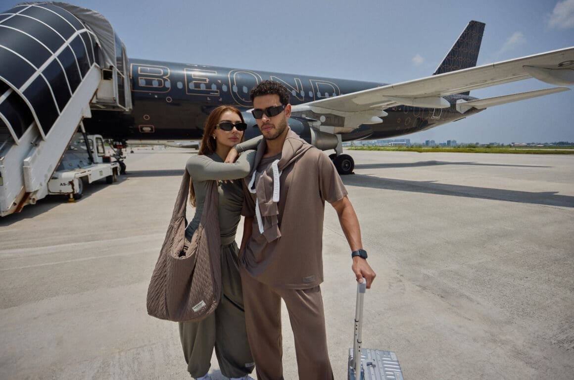 Men and women in travel outfit