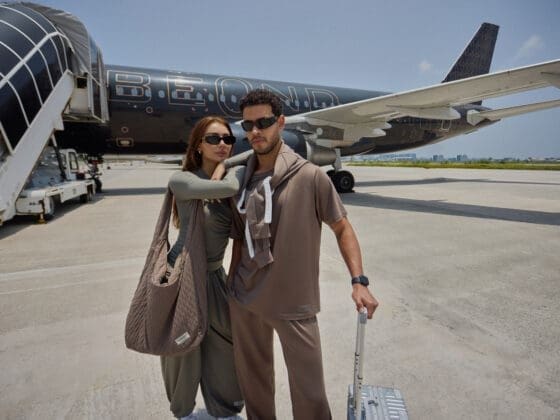 Men and women in travel outfit